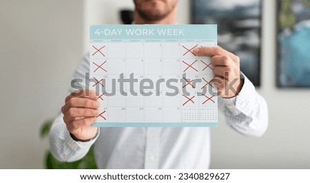 Man holding a calendar pointing to a 4-day work week concept Royalty-Free Stock Photo #2340829627