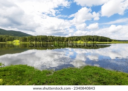 Sandikli, Afyon, Türkiye, 10 June 2023; Akdag Nature Park, nature, lake view, reflection in water.