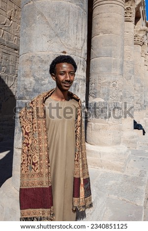 photo of smiling Nubian man in Philae Temple, Aswan, Egypt