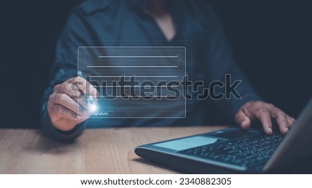 Electronic signature concept, Businessman using a pen to sign electronic documents on virtual screen, Data sheet digital document management, Paperless office, E-signing, Online working technology.