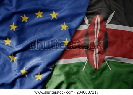 big waving realistic national colorful flag of european union and national flag of kenya . macro