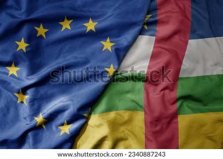 big waving realistic national colorful flag of european union and national flag of central african republic . macro