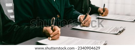 Panorama view of corporate executives sign joint business contract in boardroom, negotiating partnership agreement for collaboration. Professional agreement between big corporations. Prodigy