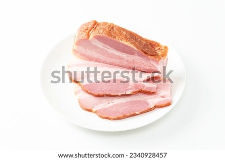 Sliced bacon on white background.