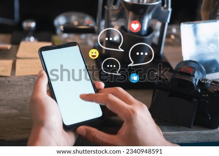 Young woman hand use smartphone  with chat and communication social media icons.