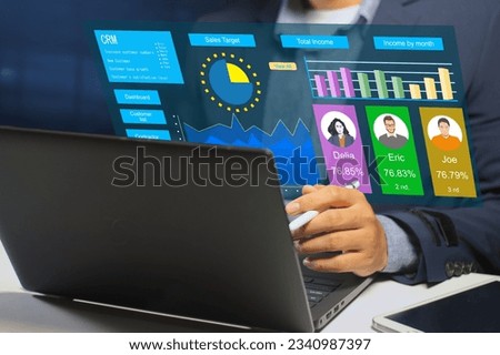 CRM Customer Relationship Management, Businessman works on the computer with CRM software. Royalty-Free Stock Photo #2340987397