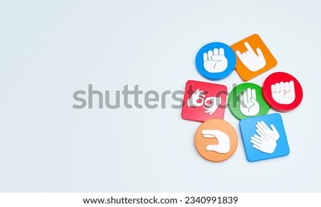 Disability or sign language icons engraved on plastic cubes and circles. 3D Rendering.