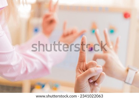 hand gestures -health Center, children Royalty-Free Stock Photo #2341022063
