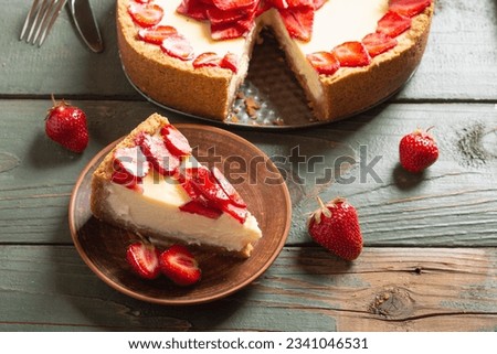 Baked Strawberry cheesecake New York with mint. Heart form. Homemade dessert front view Royalty-Free Stock Photo #2341046531