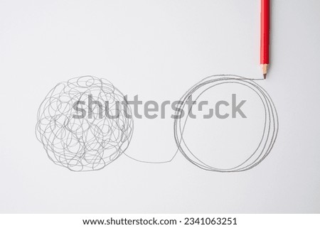 Flat lay of pencil hand drawing line chaos to order circle on paper background. Concept of abstract business management strategy, reorganize, problem solving solution, psychology mental health. Royalty-Free Stock Photo #2341063251