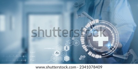Digital healthcare on futuristic hologram concept. Artificial intelligence (AI) , Innovation and technology in healthcare for electronic health records, automated diagnosis, clinical decision making. Royalty-Free Stock Photo #2341078409