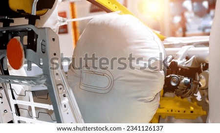 Modern car showing airbag inside Royalty-Free Stock Photo #2341126137