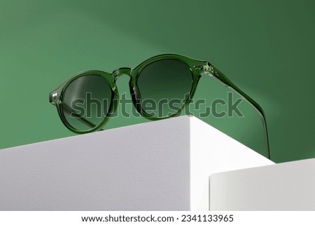 Sunglasses and glasses sale concept. Trendy sunglasses background. Trendy Fashion summer accessories. Copy space for text. Summer sale. Optic store discount poster. glasses with rounded frames. Royalty-Free Stock Photo #2341133965