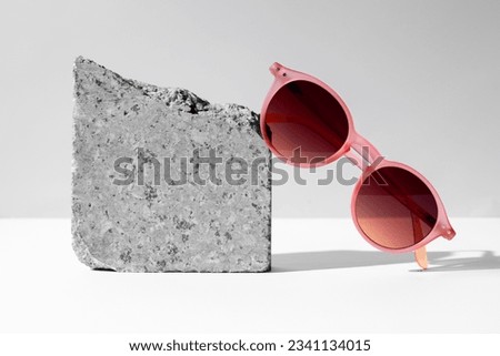 Sunglasses and glasses sale concept. Trendy sunglasses background. Trendy Fashion summer accessories. Copy space for text. Summer sale. Optic store discount poster. glasses with rounded frames. Royalty-Free Stock Photo #2341134015