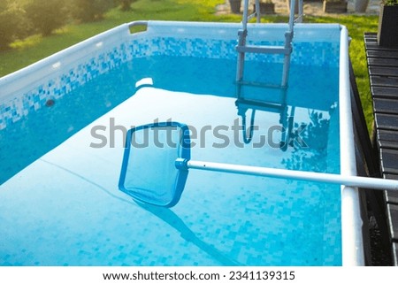 Swimming pool cleaning equipment.Service and maintenance of the pool. High quality photo Royalty-Free Stock Photo #2341139315