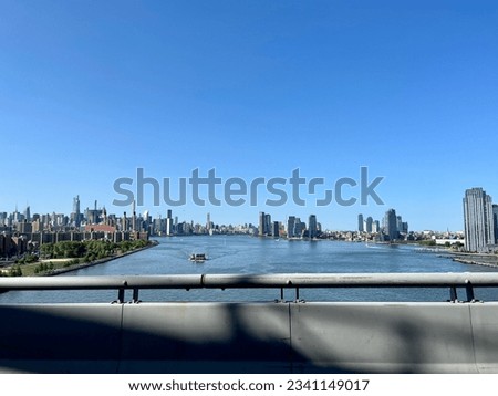 The view of the NYC skyline from the Brooklyn Bridge.