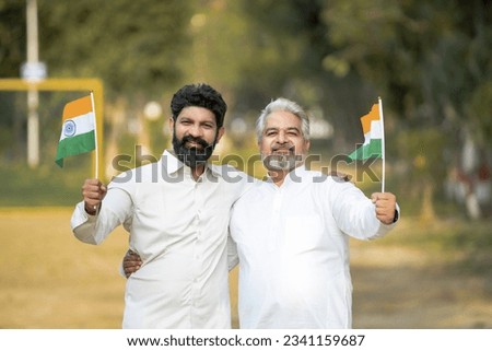 Two indian man celebrating independence day Royalty-Free Stock Photo #2341159687
