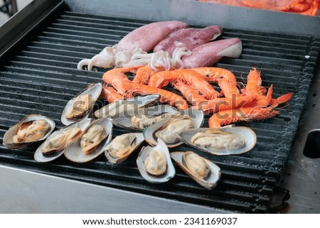 Mussels, prawns and squid, seafood on the grill