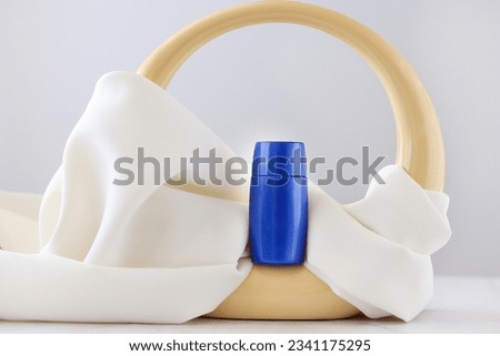 Colorful bottle on white background. Facial skin care, moisturizer concept. Fashionable and Elegant cosmetic product with a vase. Minimalist photography. Creative Skincare product photography.