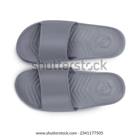 Pair of rubber slippers isolated on white background. With clipping path