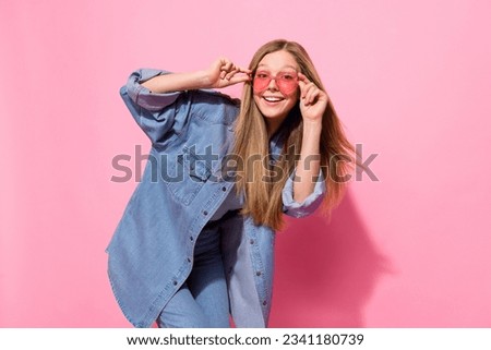 Photo portrait of lovely teen young lady disco dance summer shopping promo dressed stylish denim garment isolated on pink color background