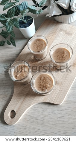 A traditional caramel payasam. This is a sweet dish that can be considered as a dessert item. Ingredients include milk, broken rice, caramelized sugar and ghee. A serving image. 