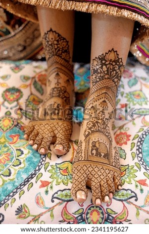 Close Shot of Brides Mehendi Legs with a Colourful Background
