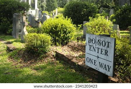 Amusing Cemetery Sign Indicating One Way Entrance.