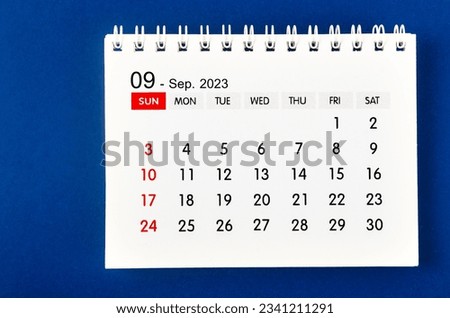 September 2023 Monthly desk calendar for 2023 year on dark blue background. Royalty-Free Stock Photo #2341211291