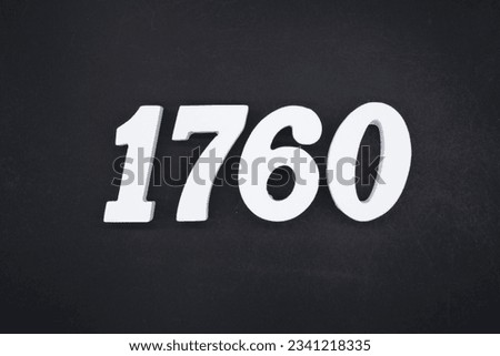 Black for the background. The number 1760 is made of white painted wood.