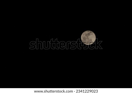 Super full moon with a dark background. This picture was taken on August 2, 2023, at 8:06 p.m. at Klaten, Central Java, Indonesia.