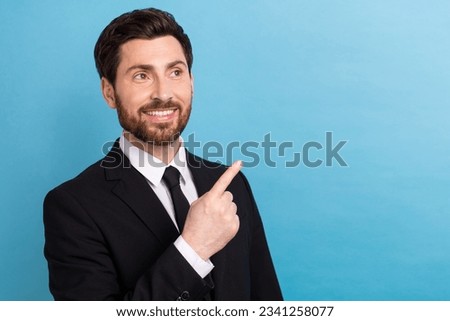 Marketing company ceo photo of young man wear black stylish tuxedo direct finger look novelty insurance isolated on blue color background