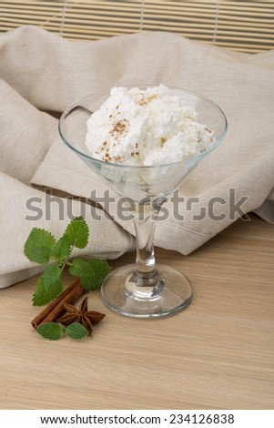 Ricotta cheese with cinnamon and mint leaves