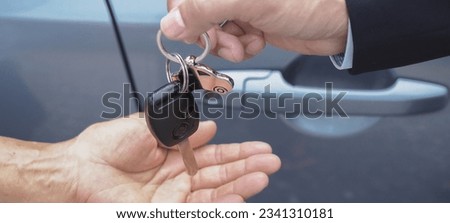 lease, rental car, sell, buy. Dealership manager send car keys to the new owner.  Sales, loan credit financial, rent vehicle, insurance,  renting, Seller, dealer, installment, car care business

