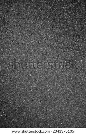 magnetic Black sand and pebbles - top view image. aerial black sand textured abstract background, water over sand dunes. Ureki, Black sea coast, Adjara, GEORGIA. Magnetiti. 