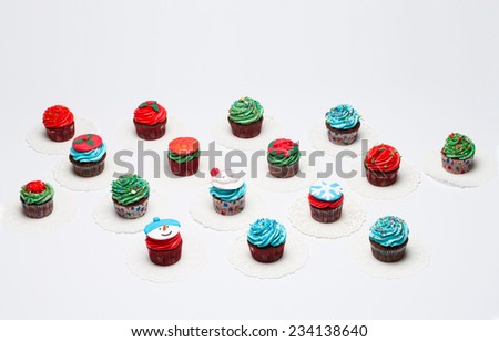 A lot of tasty cupcakes with sprinkles, chocolate. Christmas Concert