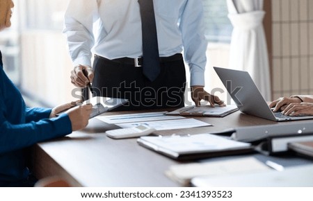 The manager explains the details of the marketing plan that has been prepared to the participants in order to brainstorm ideas for creating the participants to use tablet notebook to help the meeting. Royalty-Free Stock Photo #2341393523