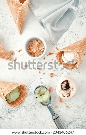 Vanilla and pistachio ice cream on a white background