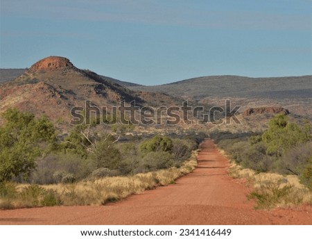 Outback road to Mount Denison Northern Territory Central Australia Royalty-Free Stock Photo #2341416449