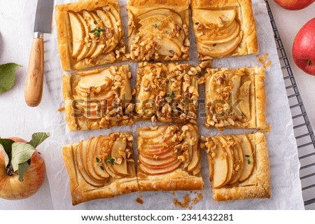Puff pastry apple galette with pecan nuts and caramel syrup, fall dessert idea