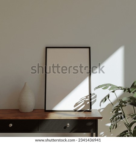 minimalist aesthetic frame mockup poster template on the table leaning on the white wall with home decor and beautiful plant. 50x70, 20x28, 20RP frame mockup poster Royalty-Free Stock Photo #2341436941