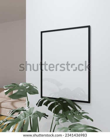 simple frame mockup poster hanging on the white wall from side view with plant decoration. 50x70, 20x28, 20RP frame mockup poster Royalty-Free Stock Photo #2341436983
