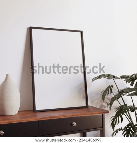 minimalist aesthetic frame mockup poster template on the table leaning on the white wall from side angle. wall in modern interior background. 50x70, 20x28, 20RP frame mockup poster