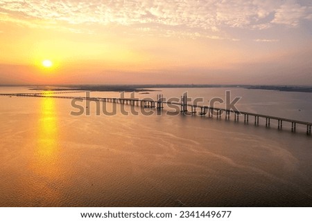 Aerial photo of Qingdao Jiaozhou Bay Cross Sea Bridge under suns