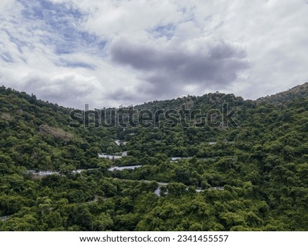 drone shot aerial view top angle beautiful dangerous mountain rocks afforestation sustainable dense forest natural scenery wallpaper background yercaud tamilnadu india tourist destination lust woods 