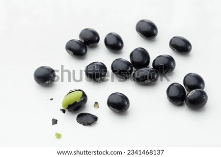close up of black beans isolated on white background. Royalty-Free Stock Photo #2341468137