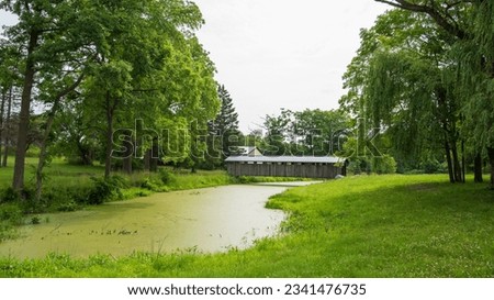 Bridge # 22-44-A

The Bass Farm Covered Bridge on private land in Metamora Township, Lapeer County, Michigan