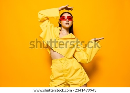 fashion woman attractive yellow girl trendy sunglasses lifestyle smile young beautiful Royalty-Free Stock Photo #2341499943