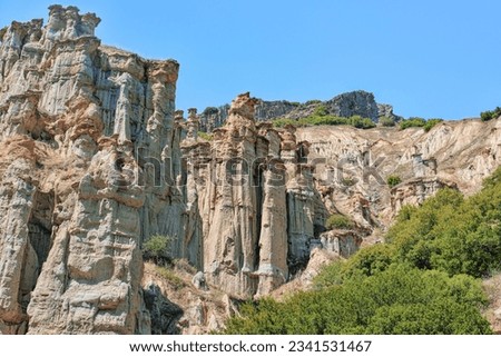 Manisa, Turkey - July 12, 2023: Kula fairy chimneys geological formation also known as Kuladocia (Kuladokya) Royalty-Free Stock Photo #2341531467
