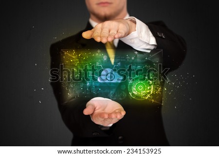 Businessman holding a shining data cloud in front of his body 